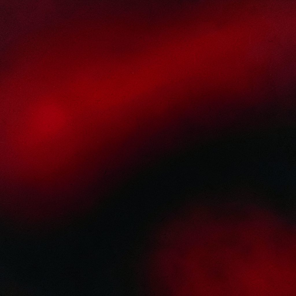 A dark atmospheric composition of deep crimson and black gradients with subtle film-grain texture, no figures