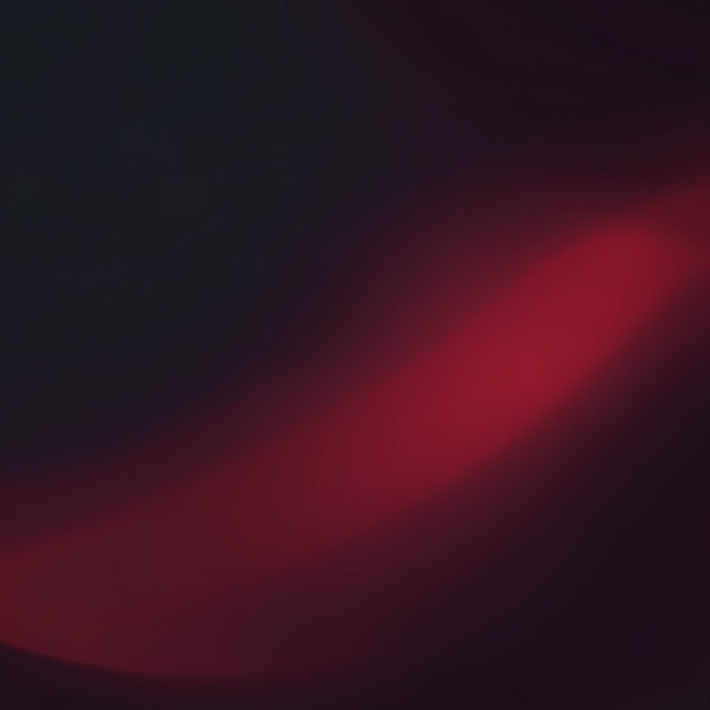 A moody abstract blend of charcoal and maroon tones suggesting a dimly lit cinema interior